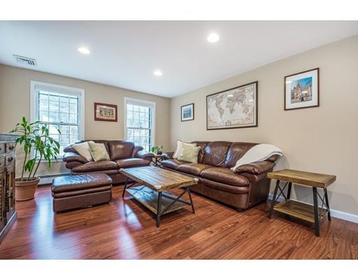 67 Wildwood Road Stow, MA 01775 - Photo 6 of 30 a living room with furniture and wooden floor