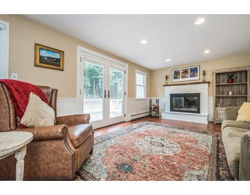 67 Wildwood Road Stow, MA 01775 - Photo 8 of 30 a living room with furniture window and a fireplace