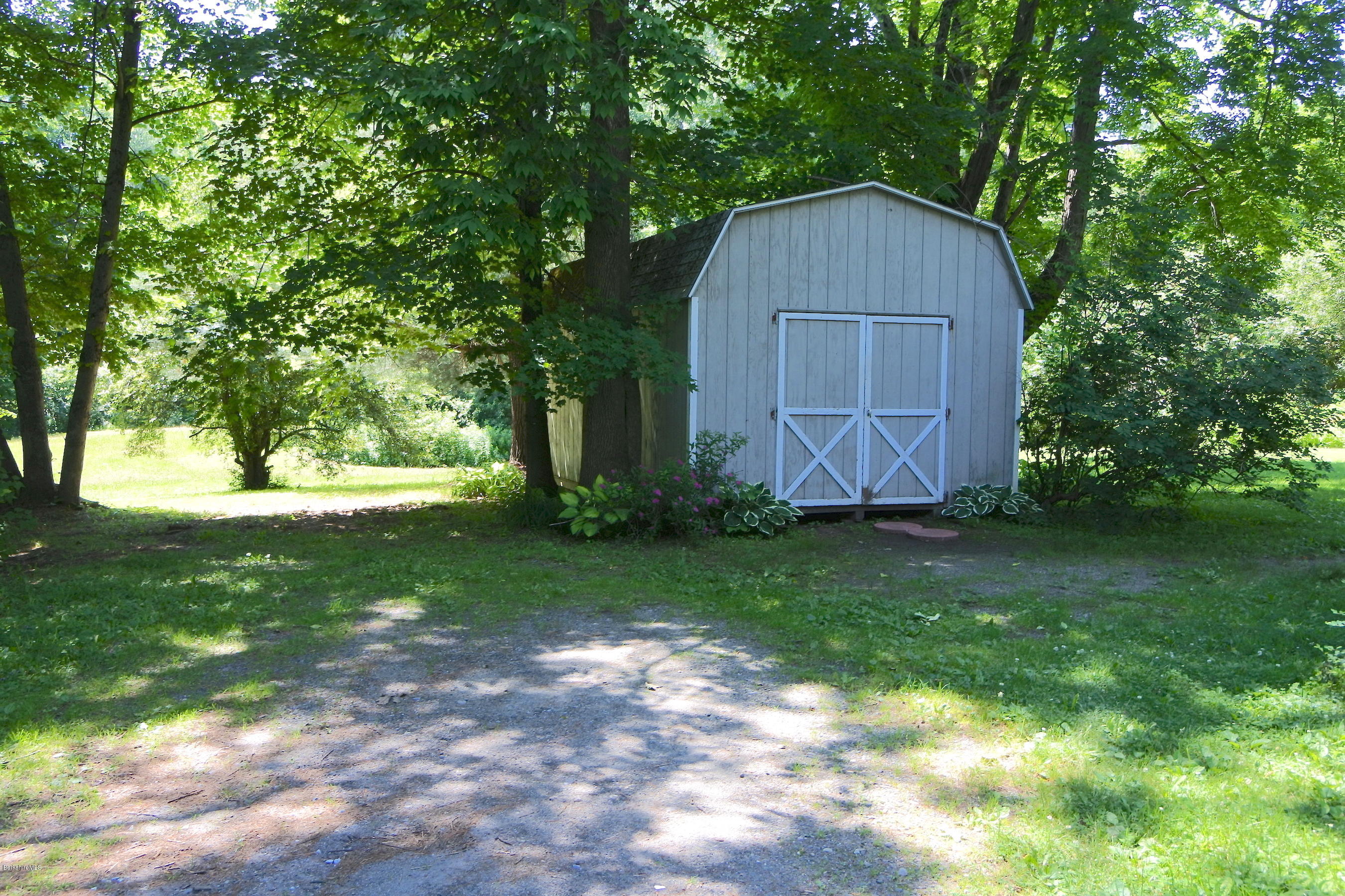 2609 State Road Richmond, MA 01254 - Photo 12 of 22 a view of backyard with tub and trees