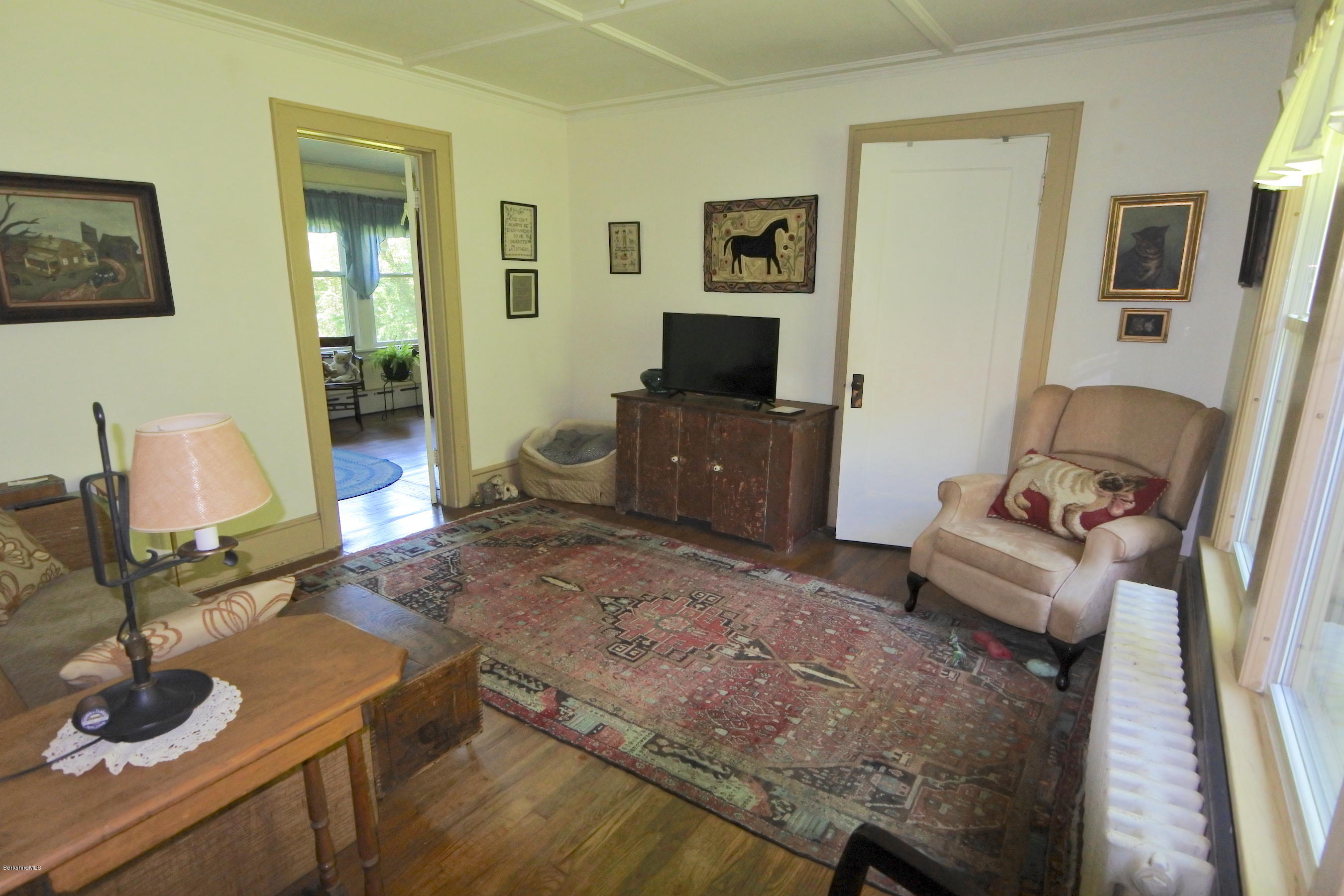 2609 State Road Richmond, MA 01254 - Photo 15 of 22 a living room with furniture and a flat screen tv