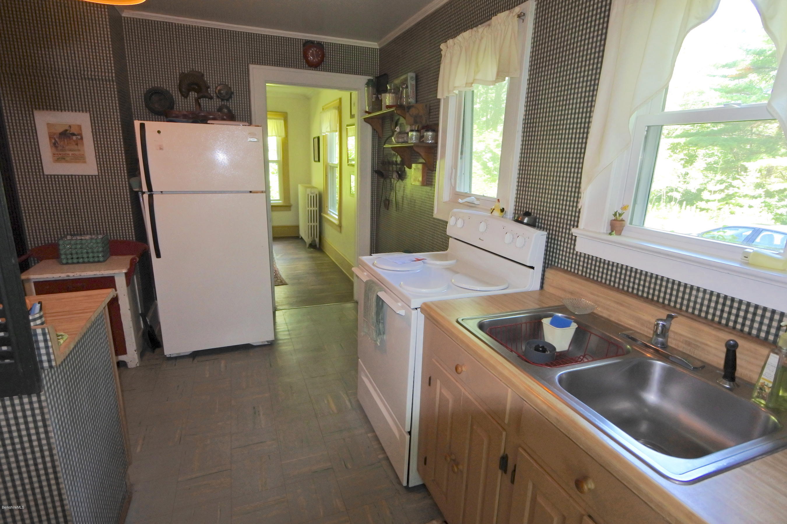2609 State Road Richmond, MA 01254 - Photo 17 of 22 a kitchen that has a sink a stove and a refrigerator