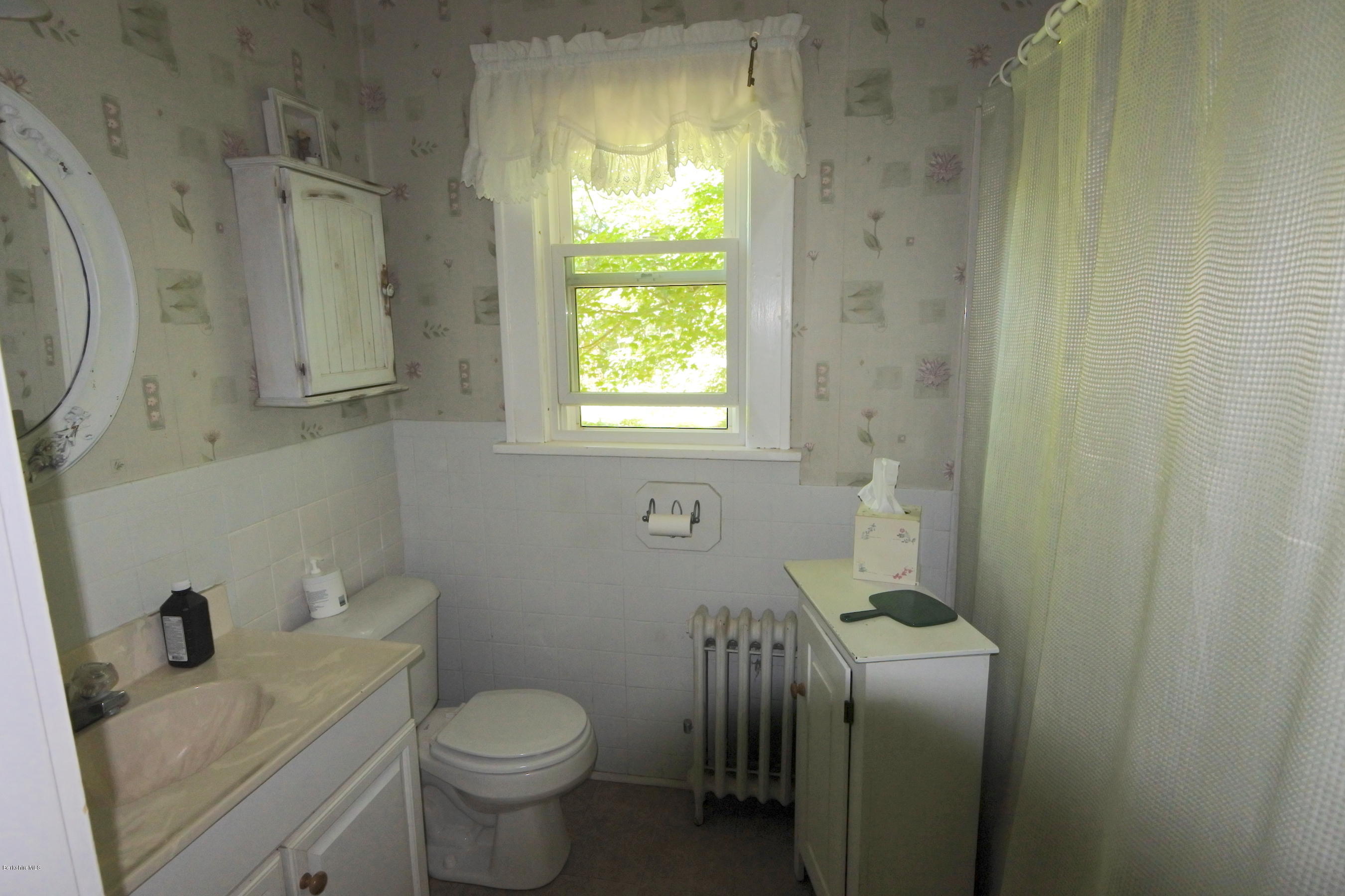 2609 State Road Richmond, MA 01254 - Photo 22 of 22 a bathroom with a toilet sink and tub