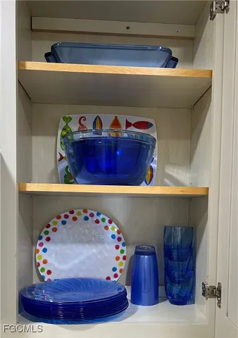 a room with furniture and wooden floor