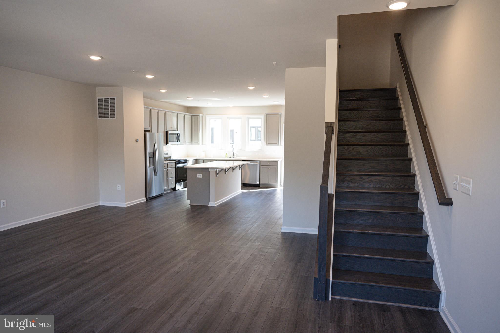 238 Mainstream Drive Laurel, MD 20724 - Photo 3 of 45 a view of kitchen and wooden floor