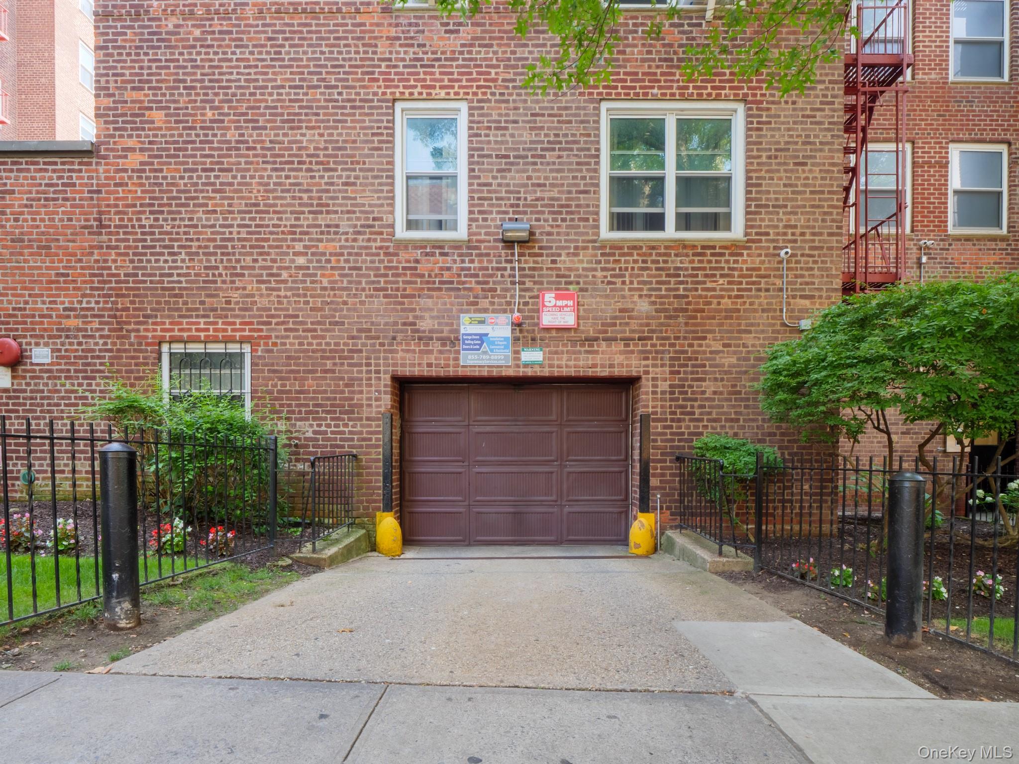 34-15 74th Street, Unit 4H Queens, NY 11372 - Photo 14 of 19 a view of outdoor space and front view of a house