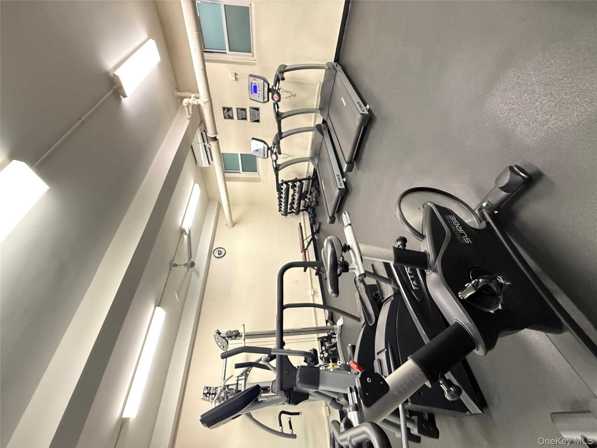 34-15 74th Street, Unit 4H Queens, NY 11372 - Photo 16 of 19 a room with gym equipment
