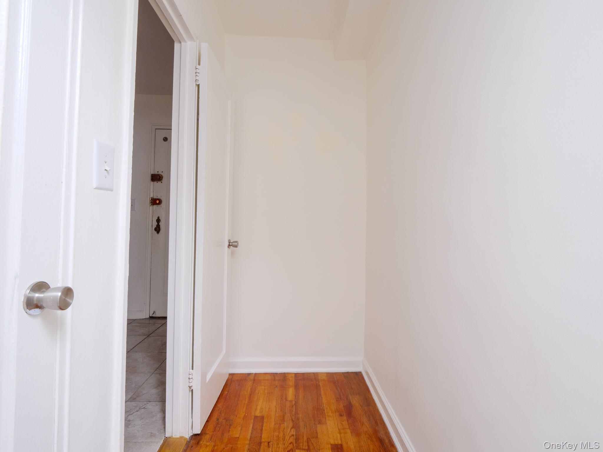 34-15 74th Street, Unit 4H Queens, NY 11372 - Photo 10 of 19 a bathroom with a shower