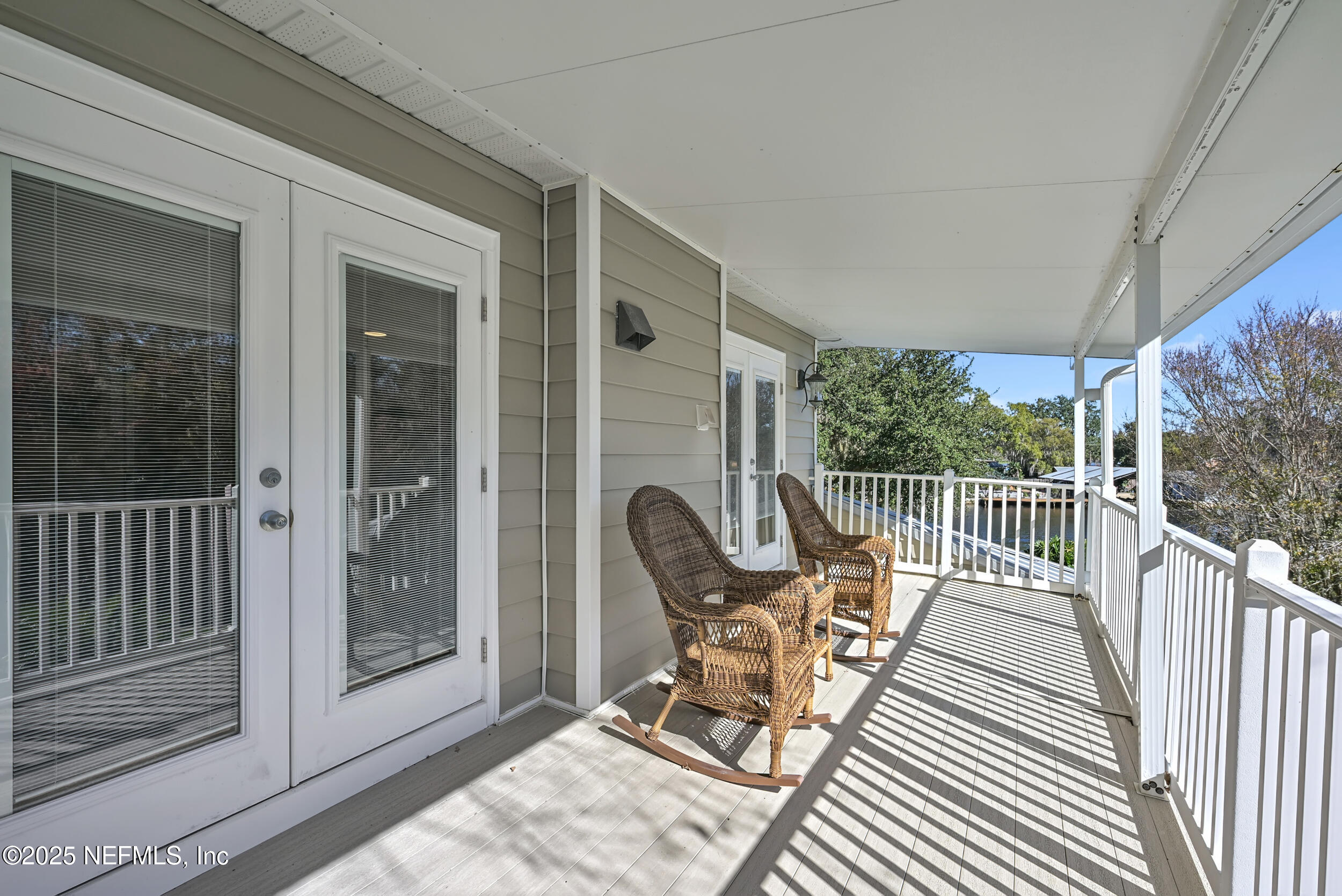 56633 Otter Road Astor, FL 32102 - Photo 24 of 69 a view of a two chair in the balcony