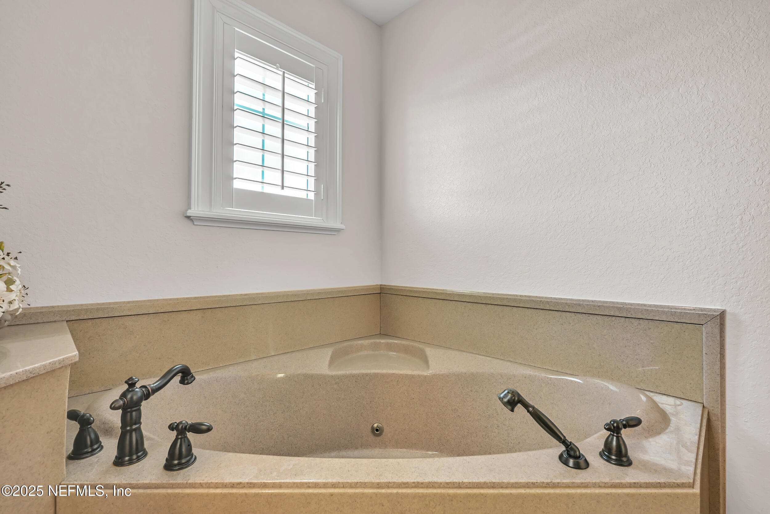 56633 Otter Road Astor, FL 32102 - Photo 25 of 69 a bathroom with a tub
