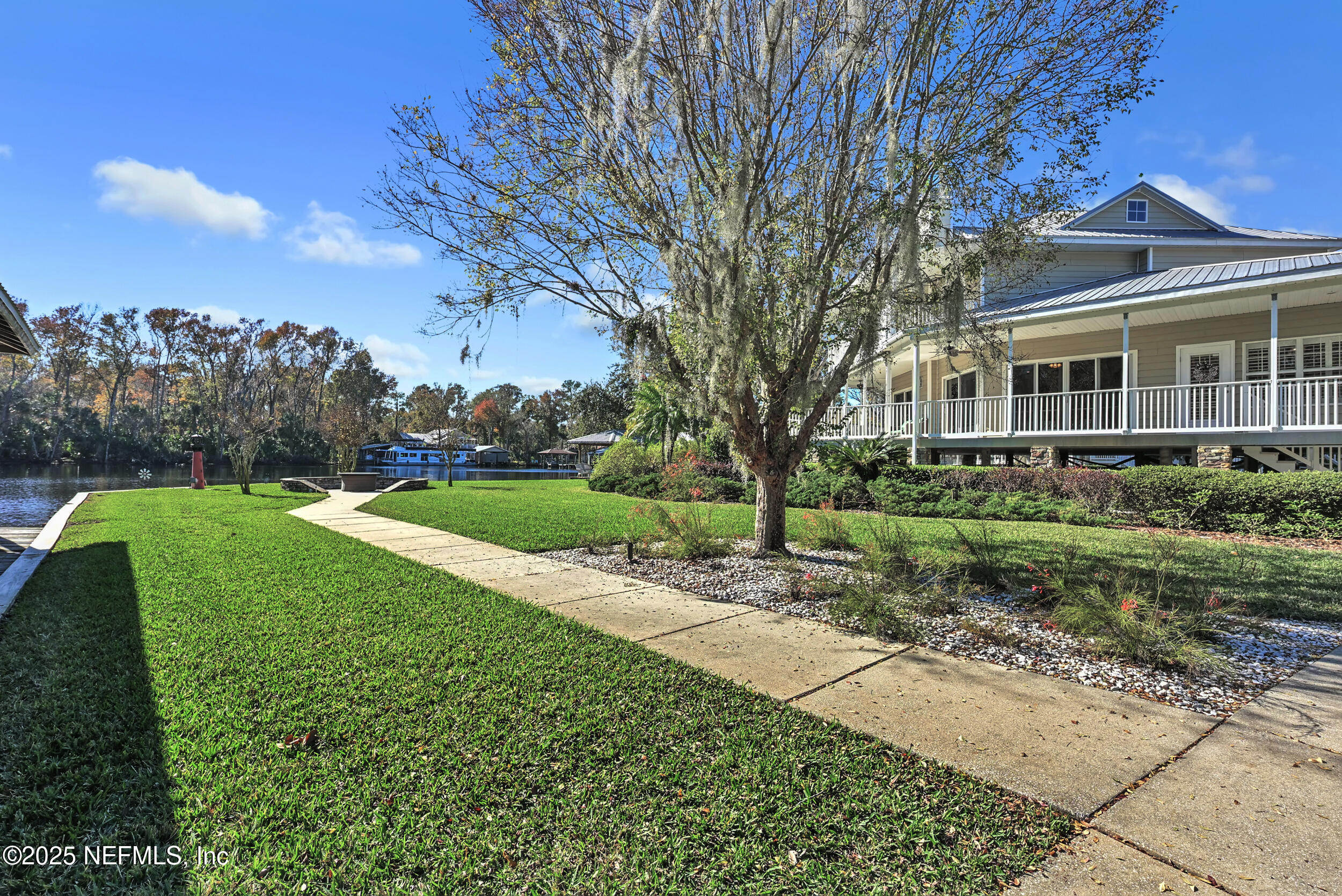 56633 Otter Road Astor, FL 32102 - Photo 57 of 69 a view of a house with a yard