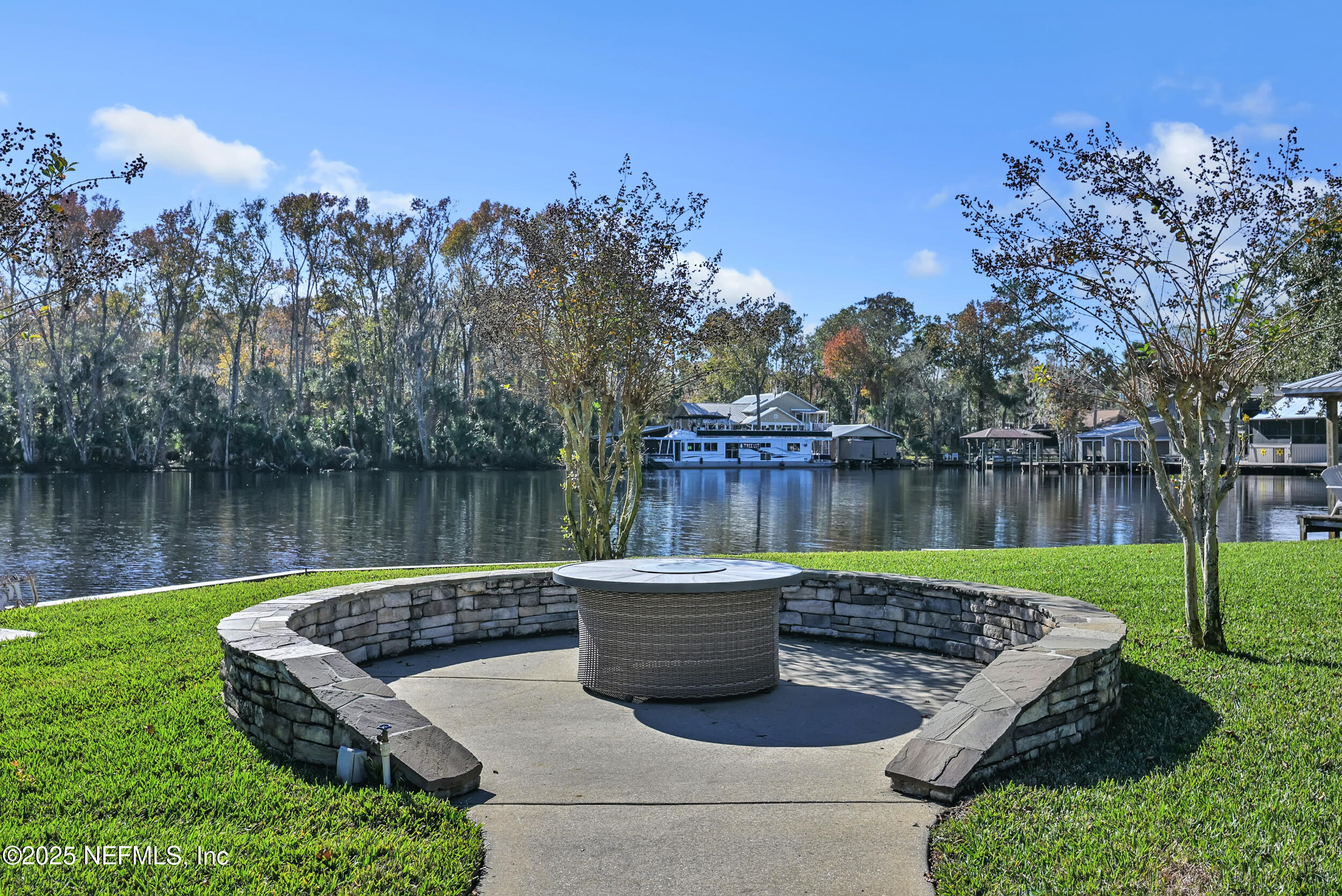 56633 Otter Road Astor, FL 32102 - Photo 6 of 69 a garden view with a lake view