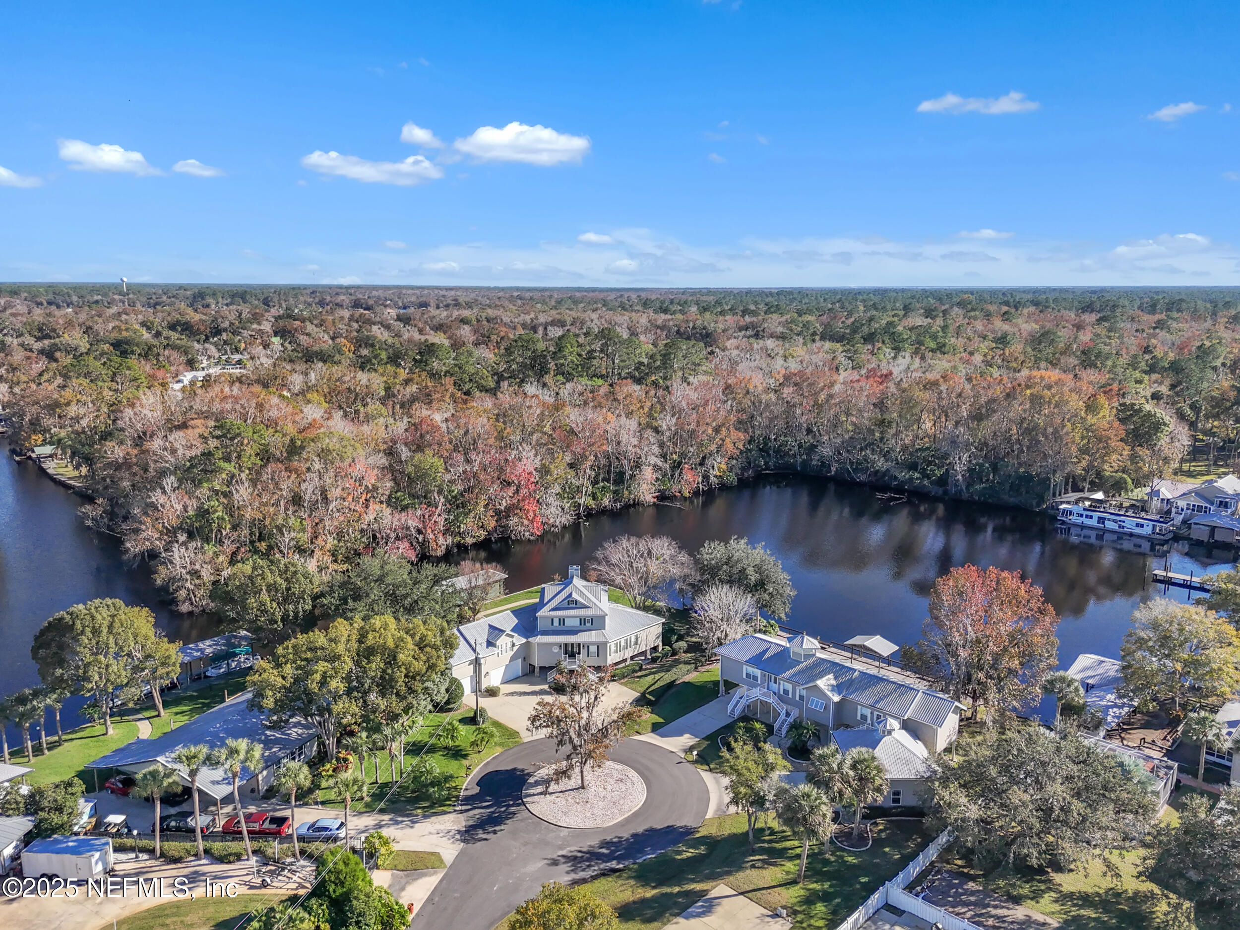 56633 Otter Road Astor, FL 32102 - Photo 65 of 69 a view of a lake with outdoor space