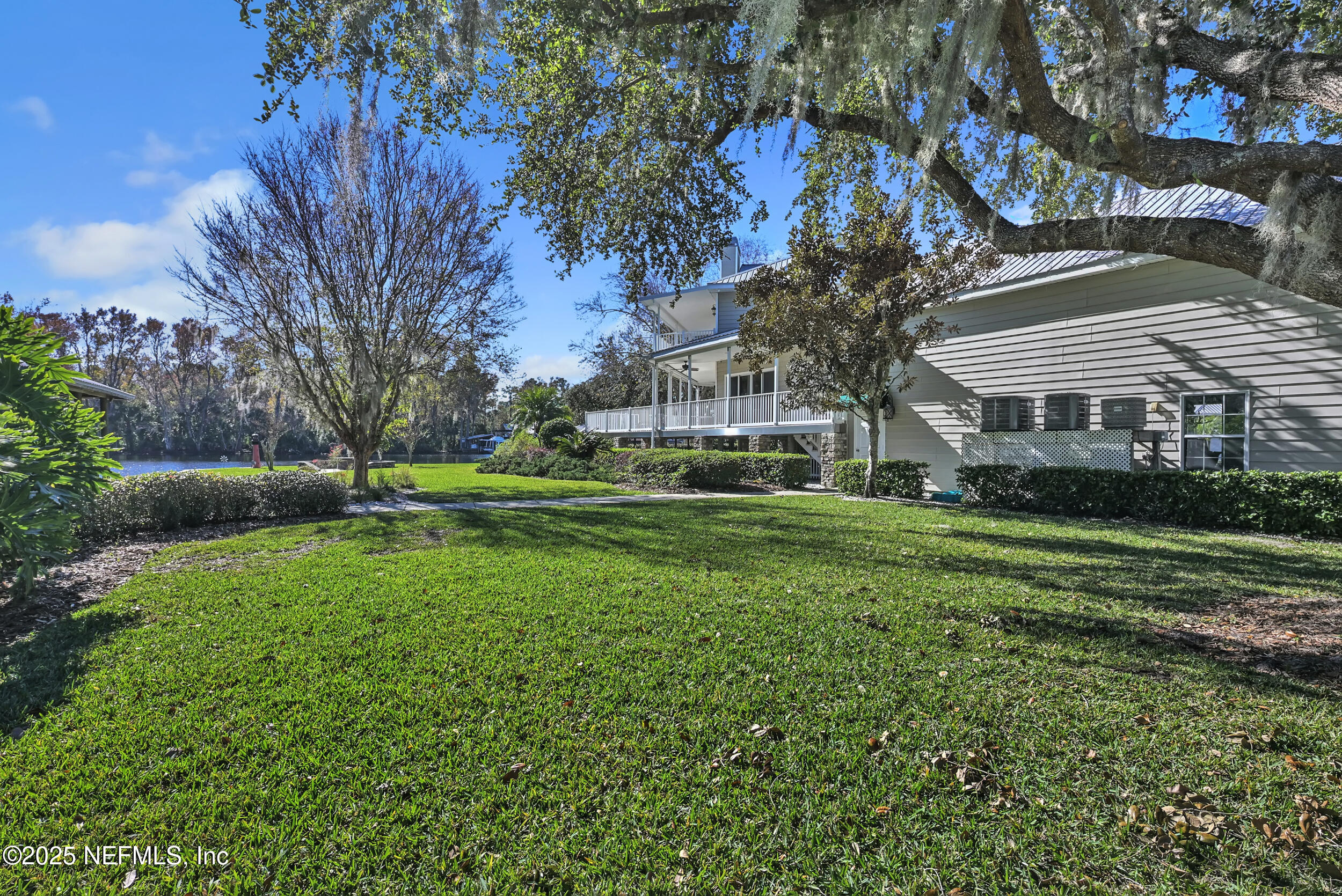 56633 Otter Road Astor, FL 32102 - Photo 66 of 69 a view of a house with a yard