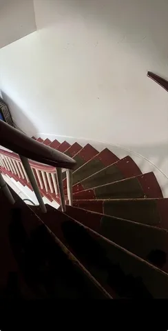 a view of balcony with furniture