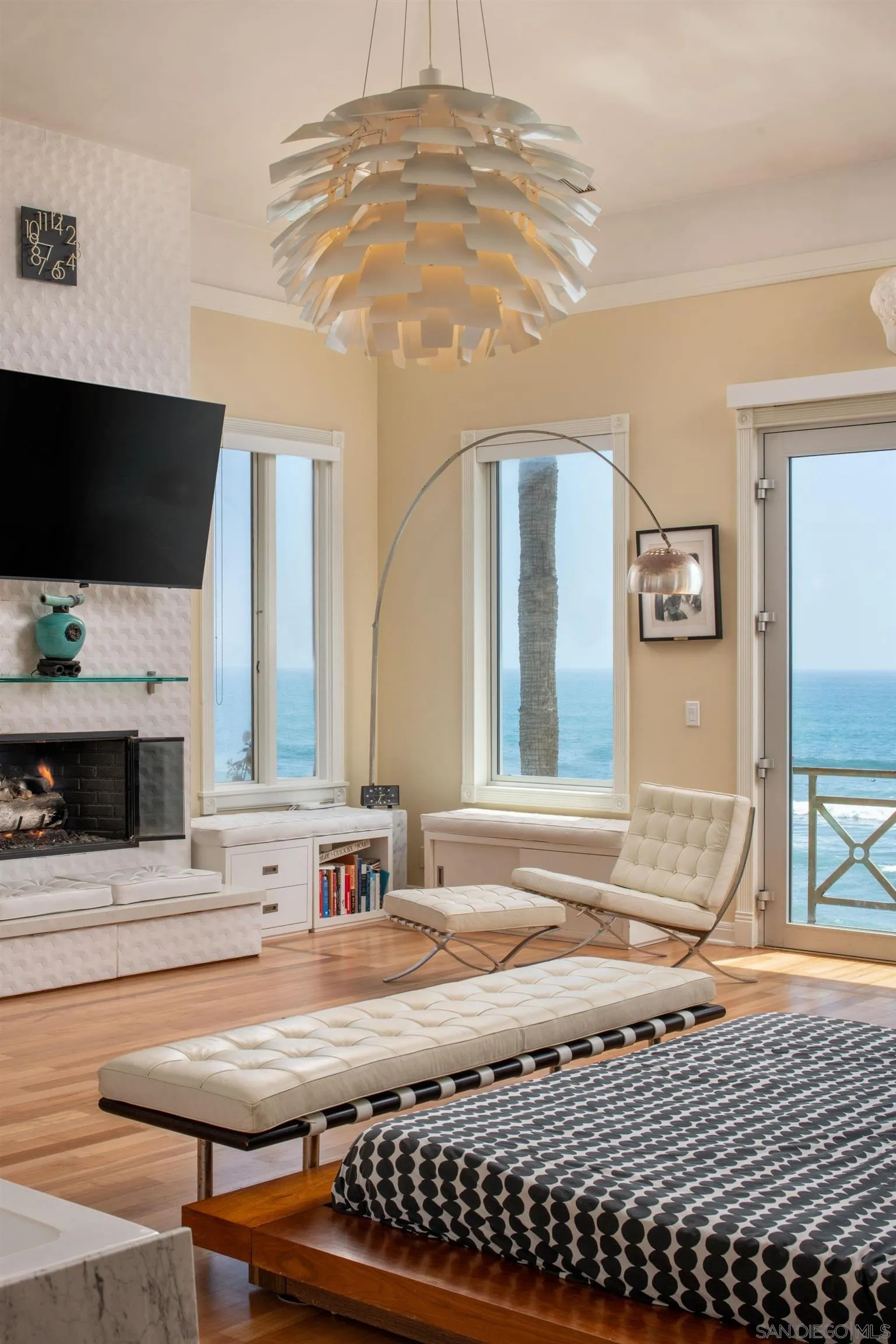 5143 Shore Drive Carlsbad, CA 92008 - Photo 33 of 66 a living room with a couch and a flat screen tv