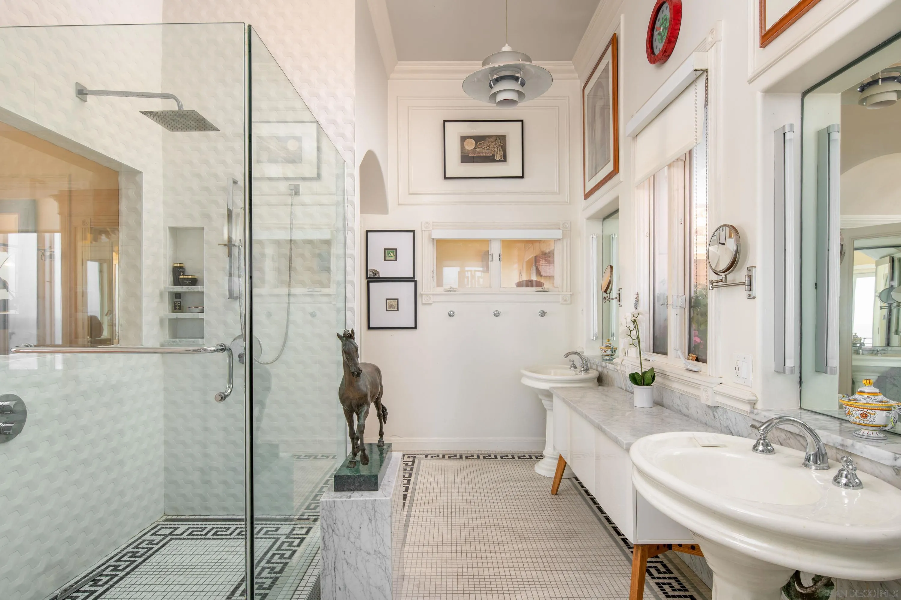 5143 Shore Drive Carlsbad, CA 92008 - Photo 38 of 66 a bathroom with a sink and a mirror