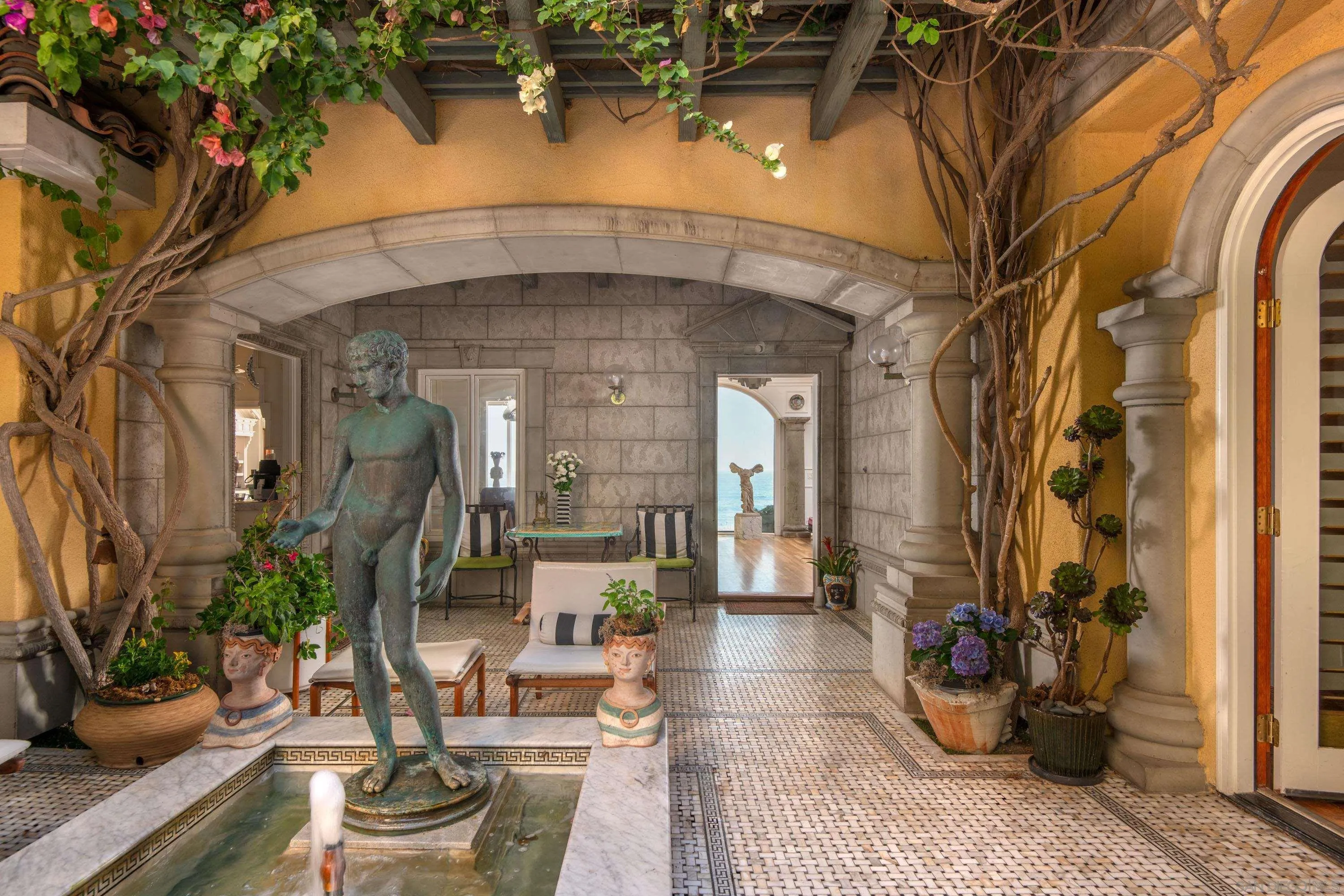 5143 Shore Drive Carlsbad, CA 92008 - Photo 40 of 66 a view of entryway and hall with wooden floor