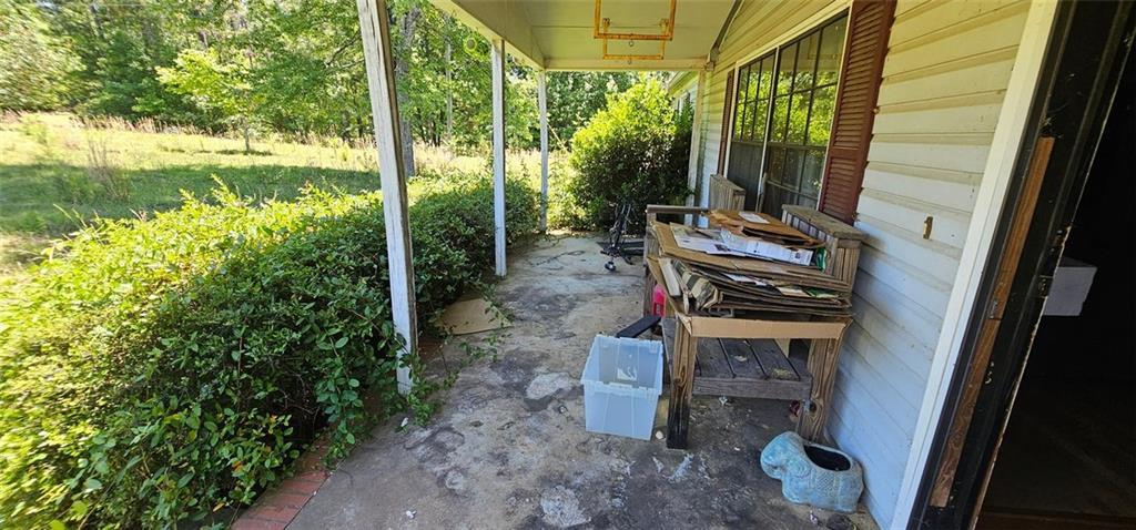 944 Lite-N-Tie Road Macon, GA 31211 - Photo 8 of 36 a backyard of a house with lots of green space