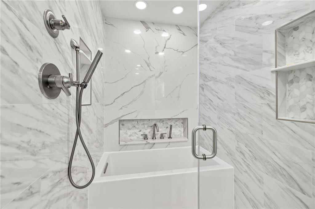 6470 Samoa Way Flowery Branch, GA 30542 - Photo 39 of 61 a bathroom with a shower