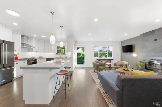 a dining room with furniture and window