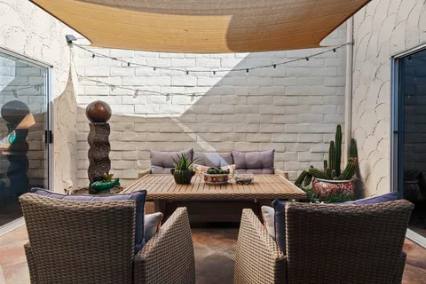 a view of outdoor space with seating area