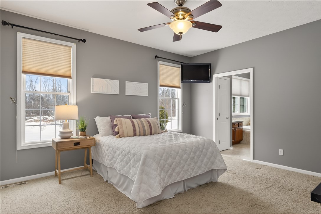 133 Blue Aspen Way Greece, NY 14612 - Photo 19 of 35 First-floor primary bedroom allows this home to li