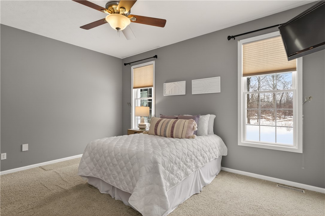 133 Blue Aspen Way Greece, NY 14612 - Photo 20 of 35 First-floor primary bedroom allows this home to li