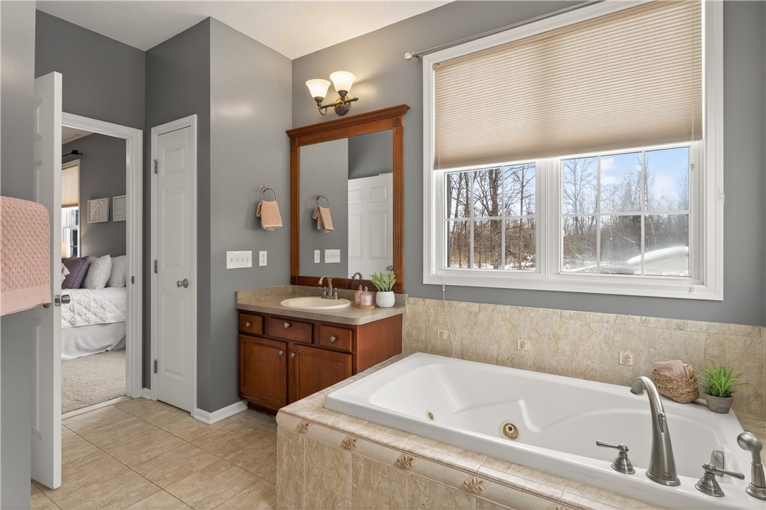133 Blue Aspen Way Greece, NY 14612 - Photo 23 of 35 En suite Bath in Primary Bedroom includes shower,