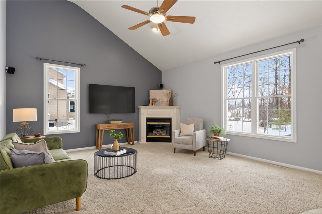 133 Blue Aspen Way Greece, NY 14612 - Photo 6 of 35 Spacious living room with dramatic volume ceilings
