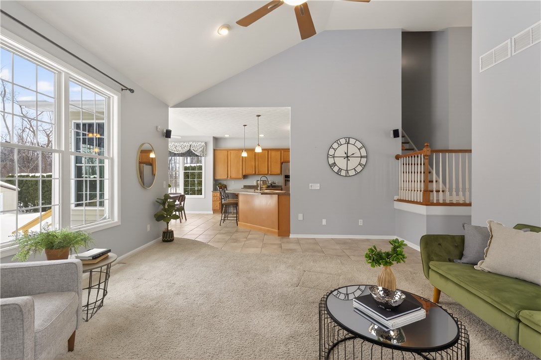 133 Blue Aspen Way Greece, NY 14612 - Photo 8 of 35 Spacious living room with dramatic volume ceilings