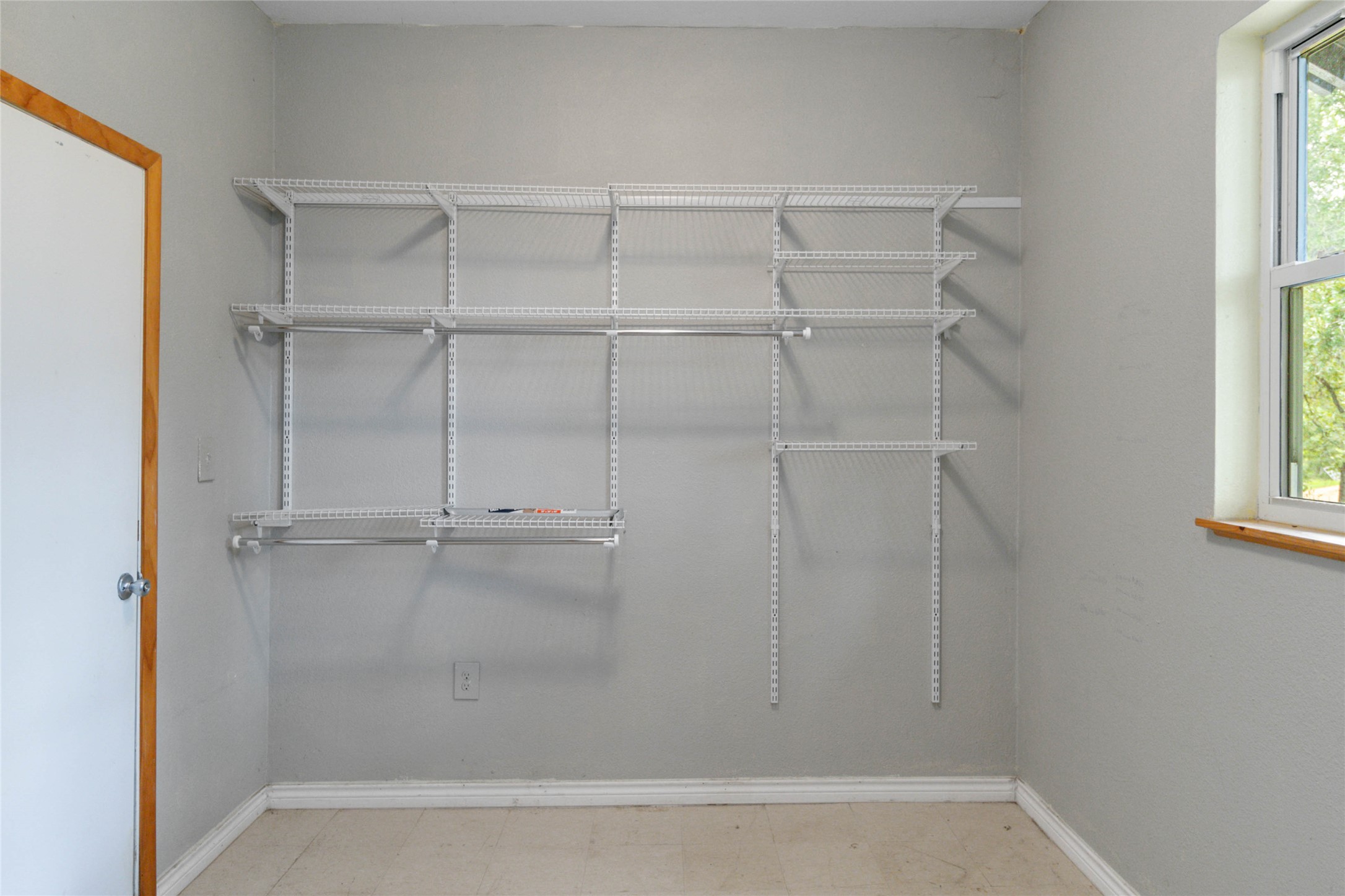 180 Ironstone Road Smithville, TX 78957 - Photo 8 of 37 Walk in closet with light floors