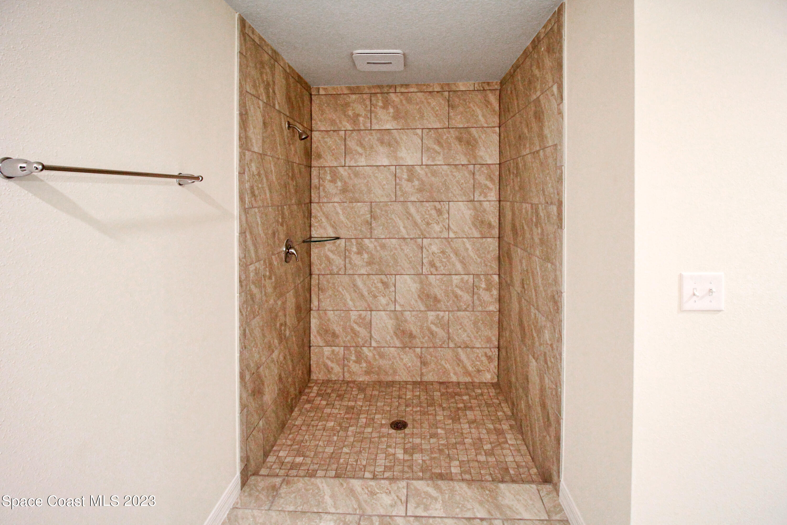 751 Schean Avenue Southwest Palm Bay, FL 32908 - Photo 9 of 12 a bathroom with a shower