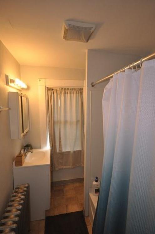 626-628 Pittsburgh Street Springdale, PA 15144 - Photo 27 of 34 a bathroom with a bathtub and a shower
