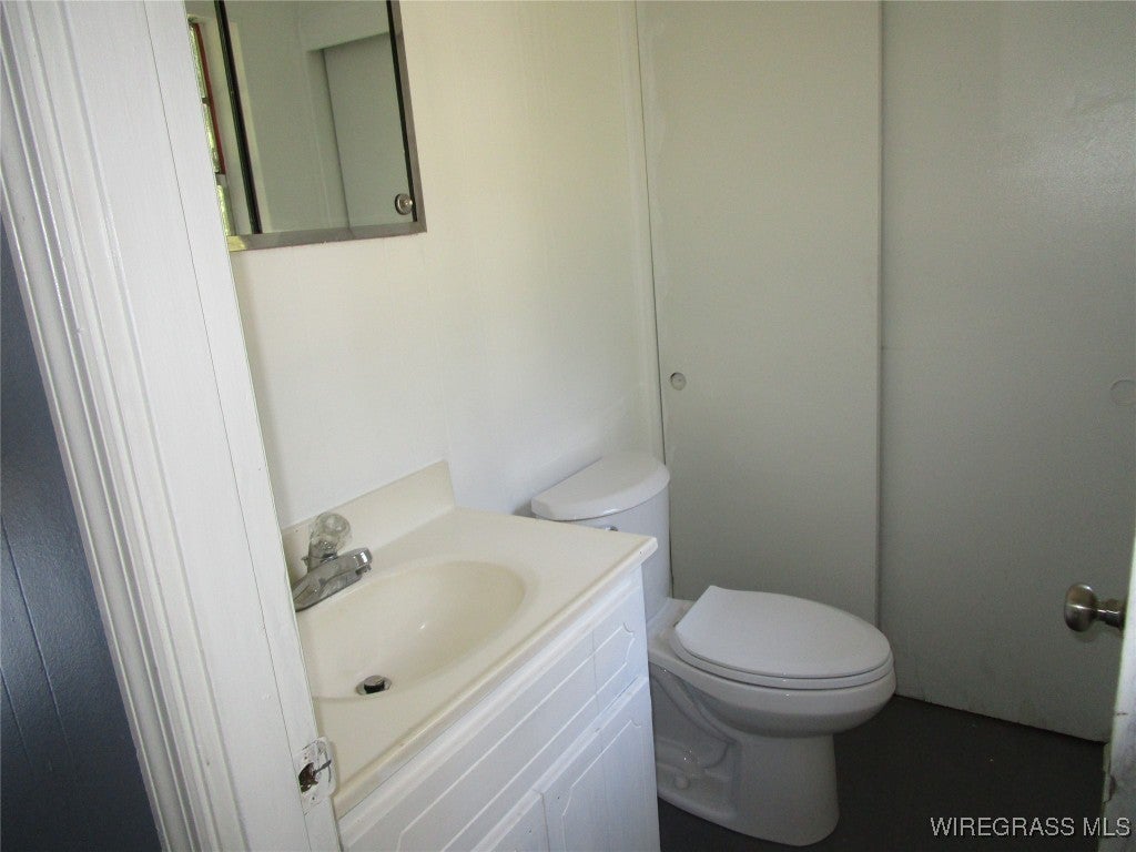 852 Crocket Road Samson, AL 36477 - Photo 12 of 18 Half bath for main bedroom
