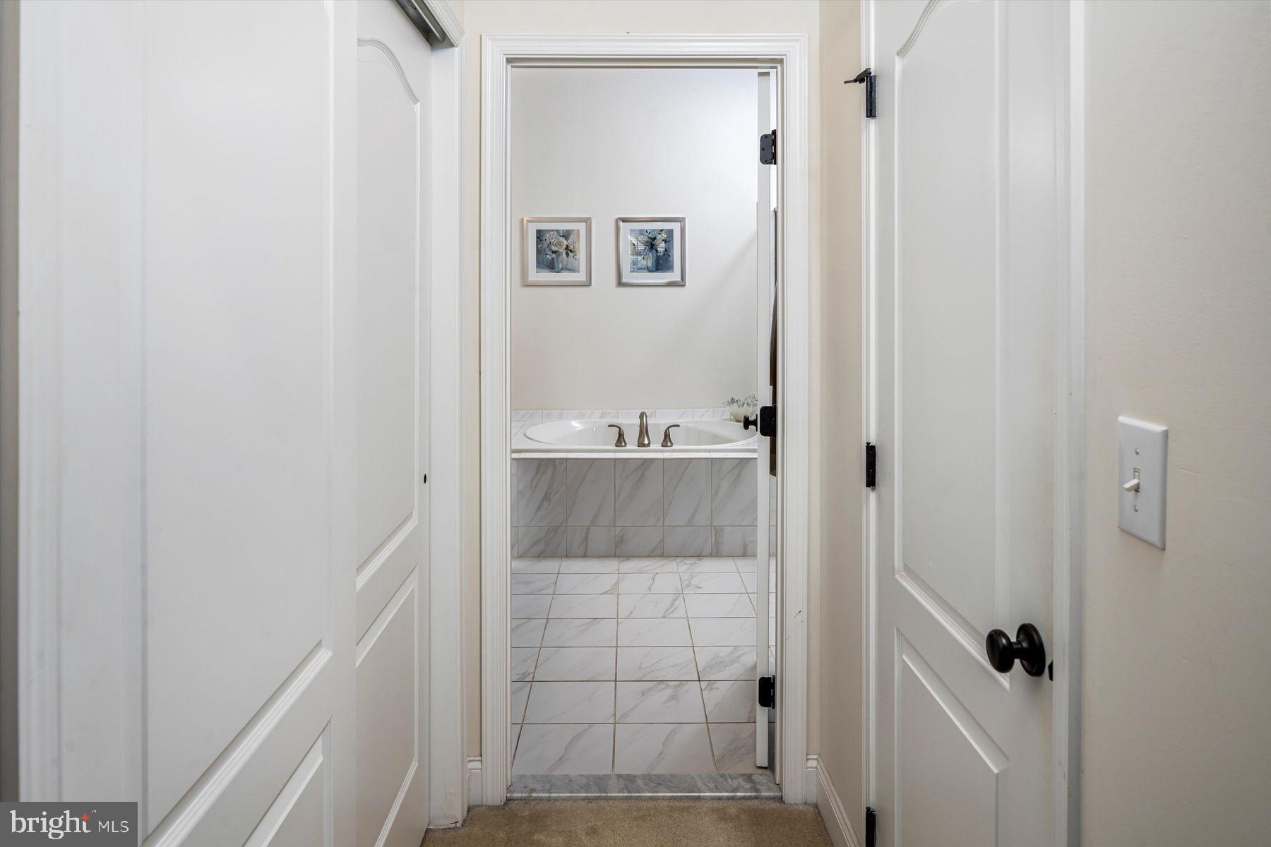91 Lilac Road Malvern, PA 19355 - Photo 16 of 34 a bathroom with a shower and a sink
