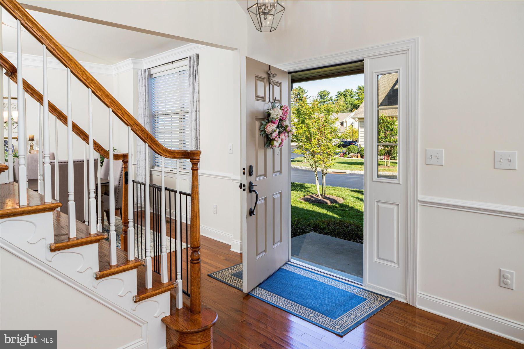91 Lilac Road Malvern, PA 19355 - Photo 2 of 34 a view of entryway with wooden floor and door