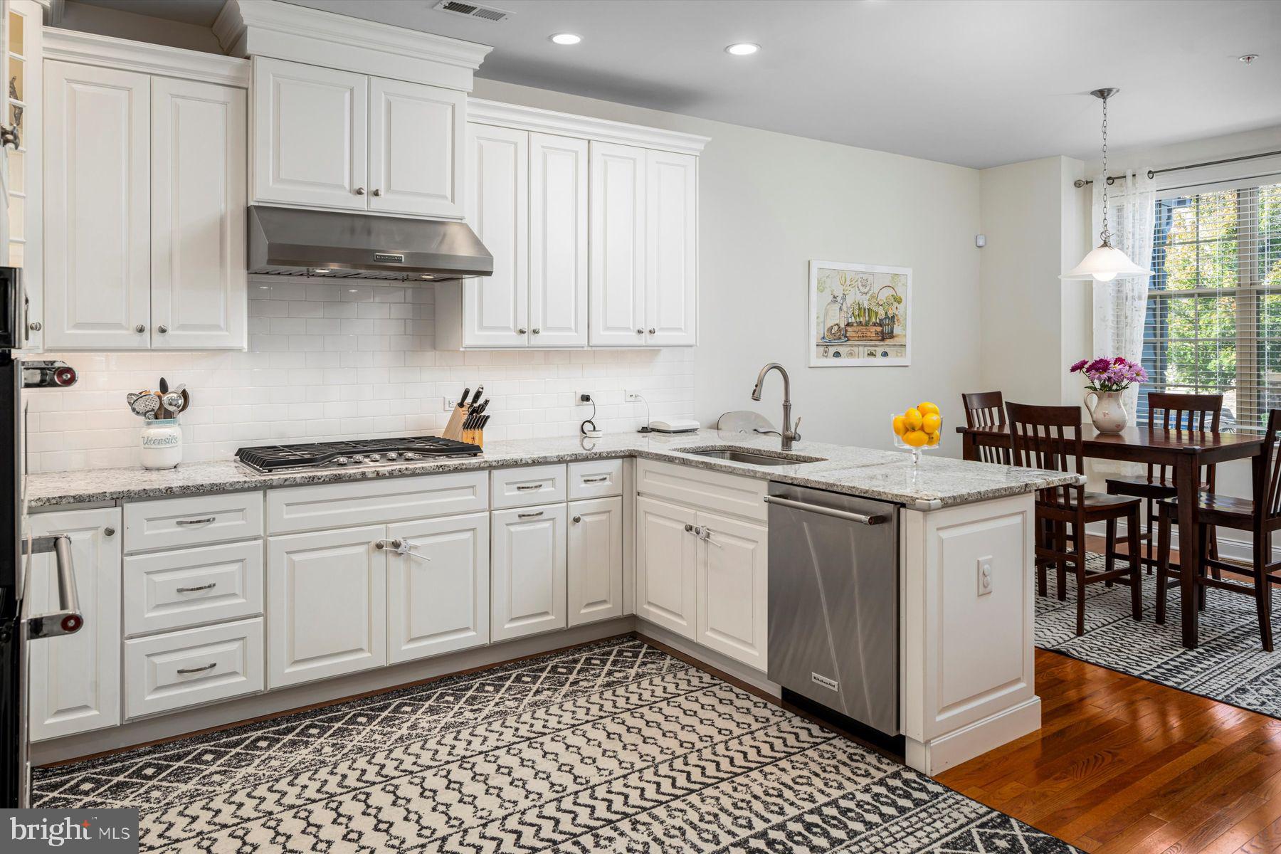 91 Lilac Road Malvern, PA 19355 - Photo 8 of 34 a kitchen with a sink and cabinets