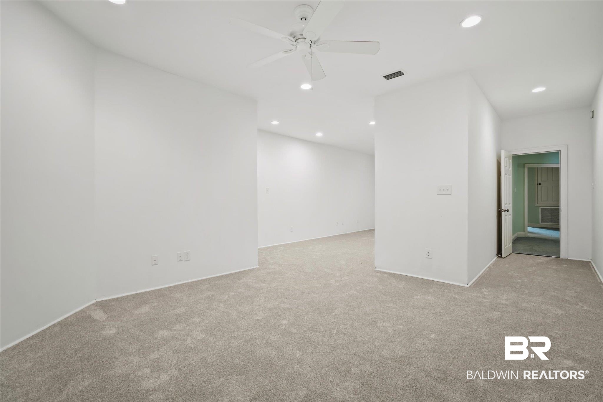 812 Country Club Court Mobile, AL 36609 - Photo 23 of 34 Carpeted spare room with ceiling fan