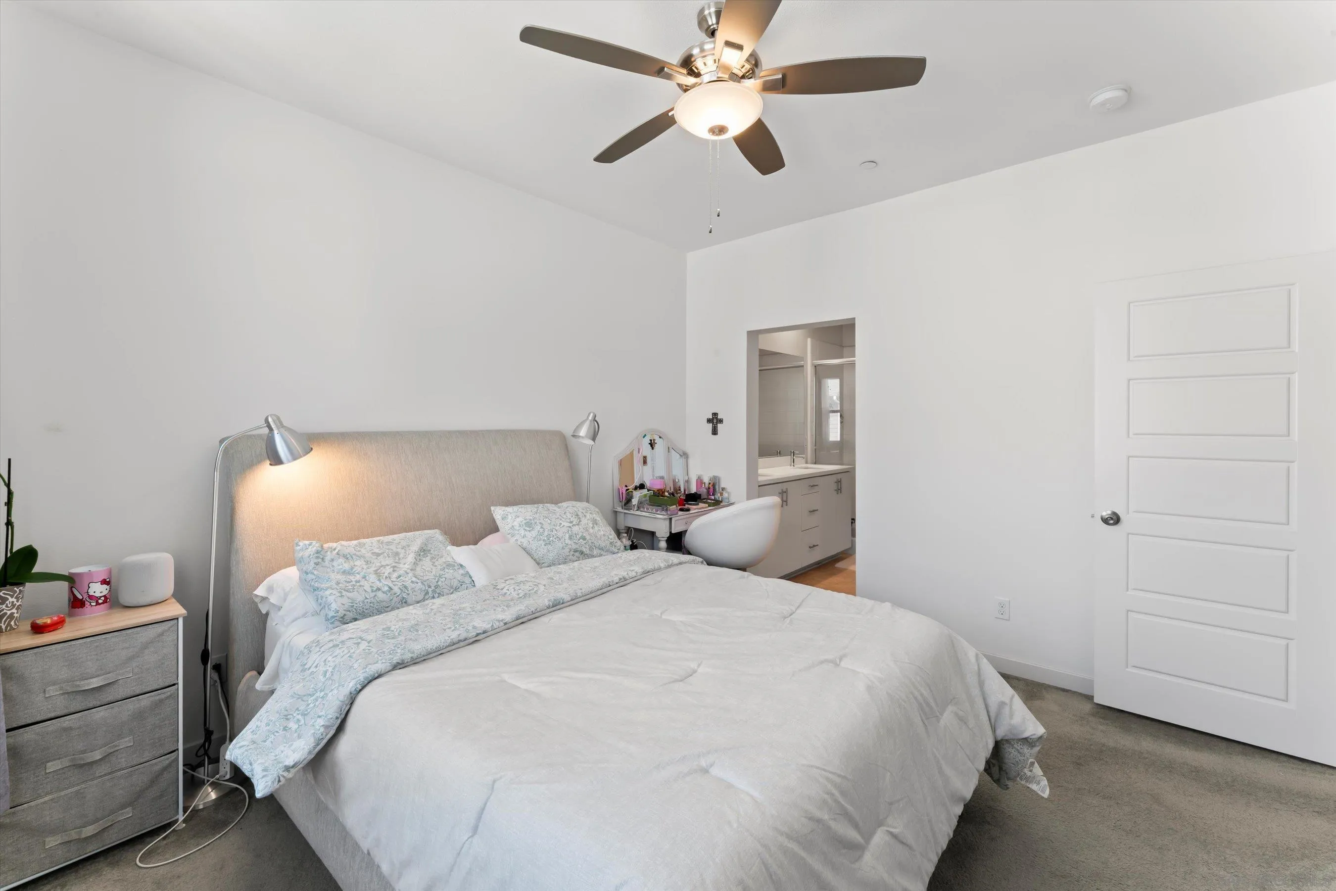 2275 Element Way, Unit 4 Chula Vista, CA 91915 - Photo 20 of 45 a bedroom with a bed and a chandelier