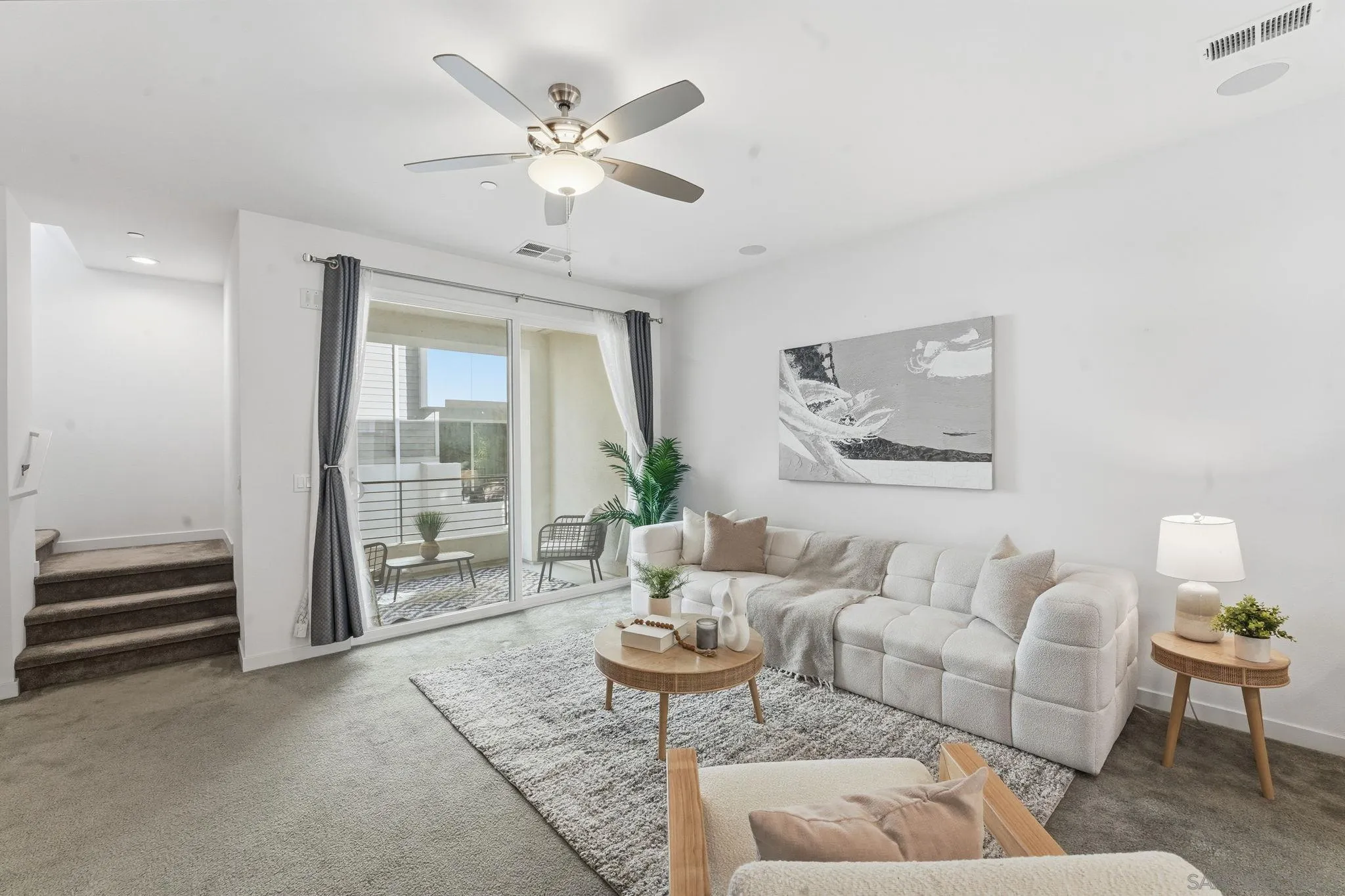 2275 Element Way, Unit 4 Chula Vista, CA 91915 - Photo 2 of 45 a living room with furniture a lamp and a chandelier