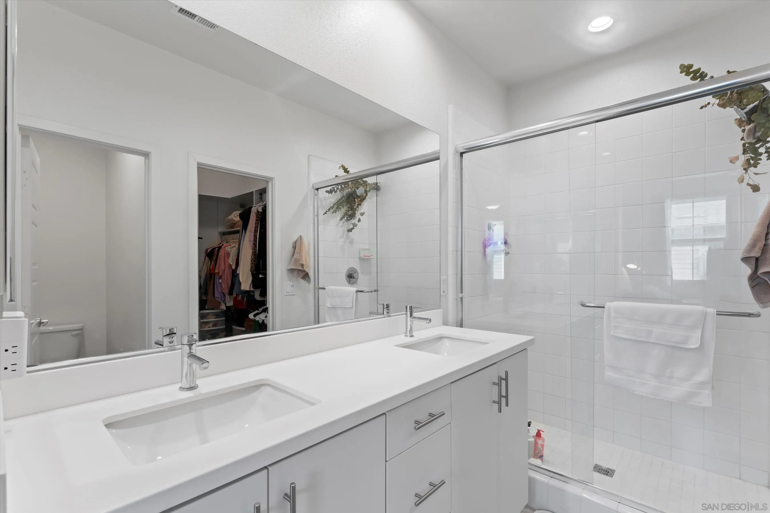 2275 Element Way, Unit 4 Chula Vista, CA 91915 - Photo 23 of 45 a bathroom with a sink and a mirror