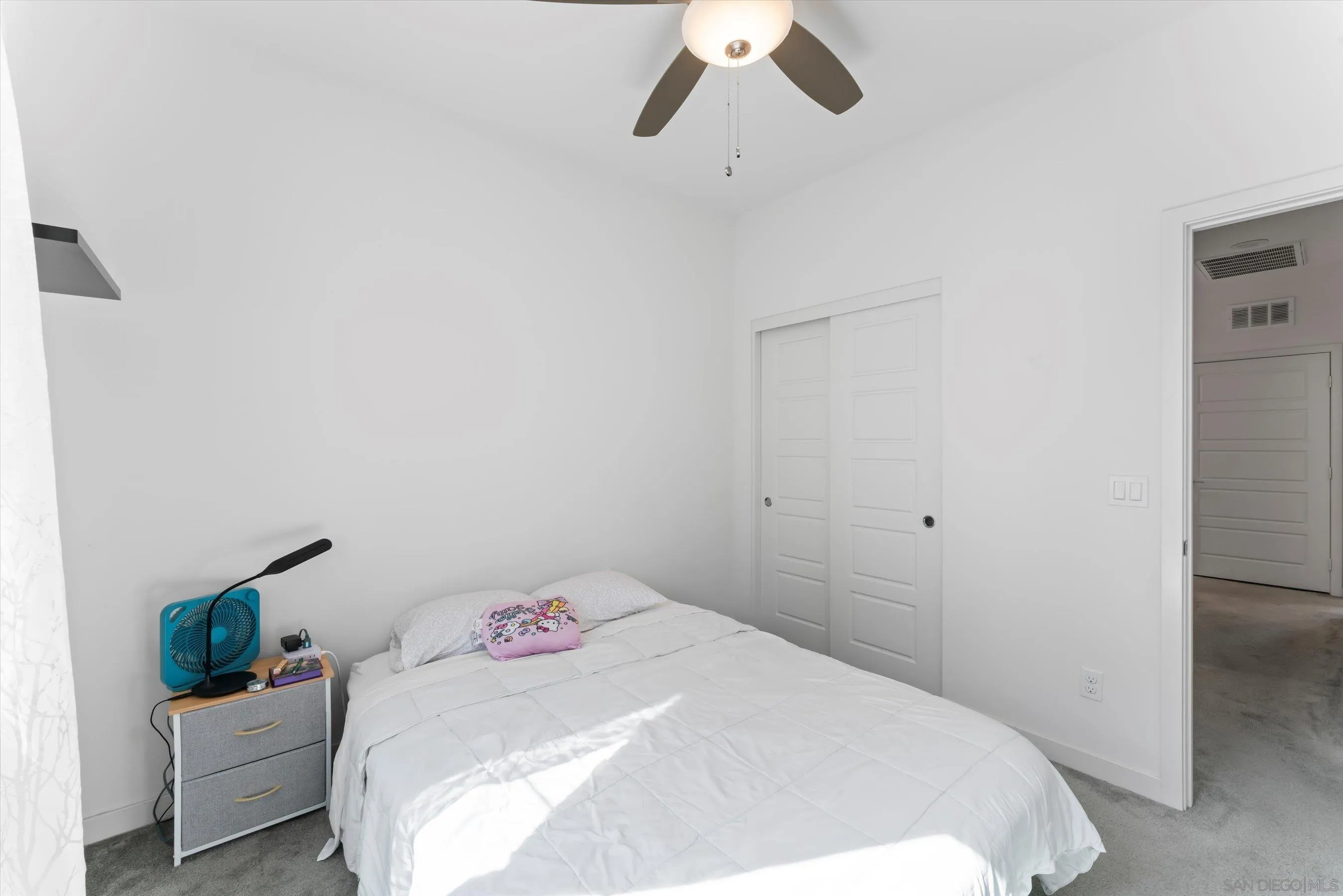 2275 Element Way, Unit 4 Chula Vista, CA 91915 - Photo 31 of 45 a bedroom with a bed and a ceiling fan