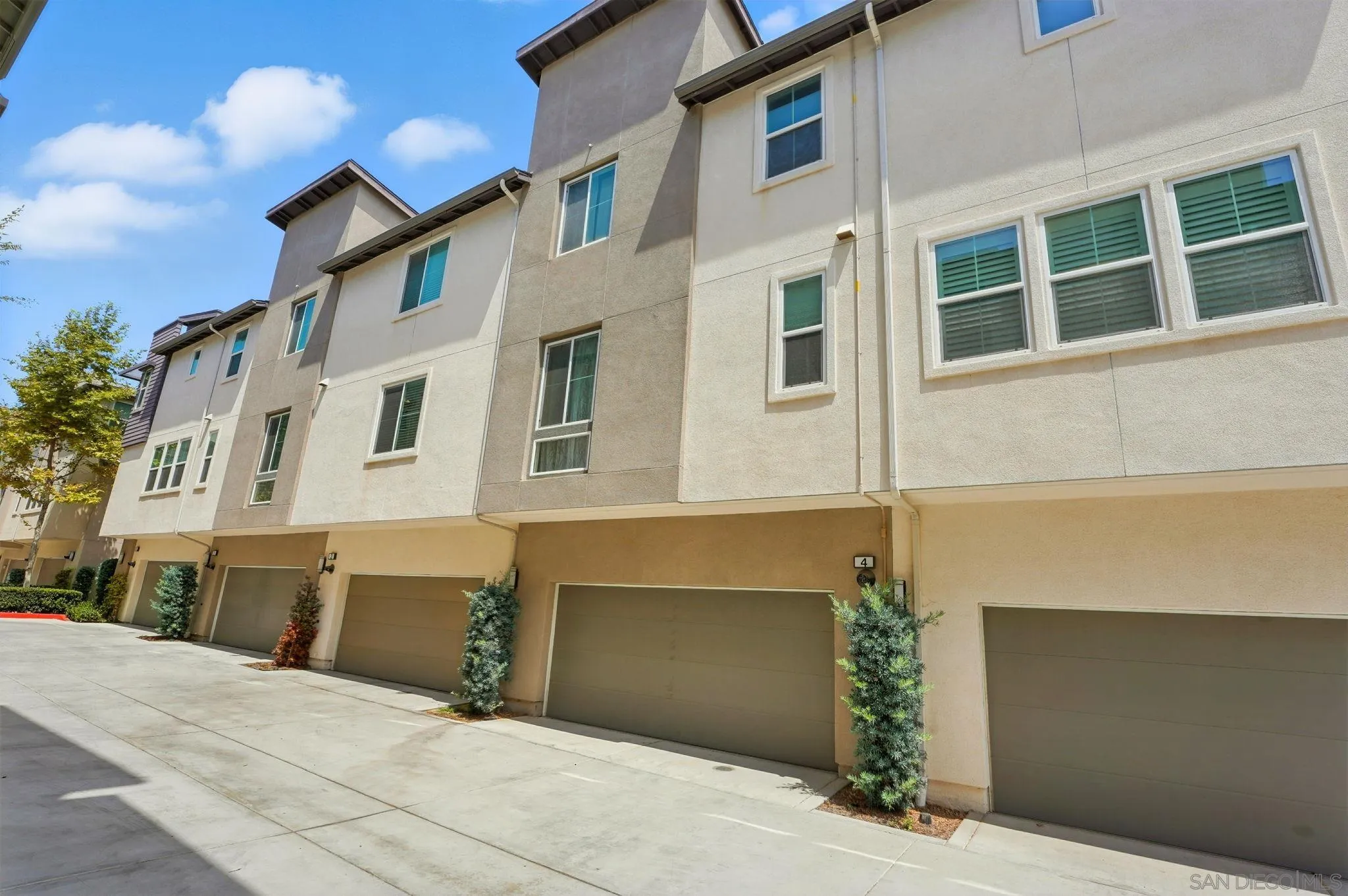 2275 Element Way, Unit 4 Chula Vista, CA 91915 - Photo 40 of 45 a front view of a building with a outdoor space