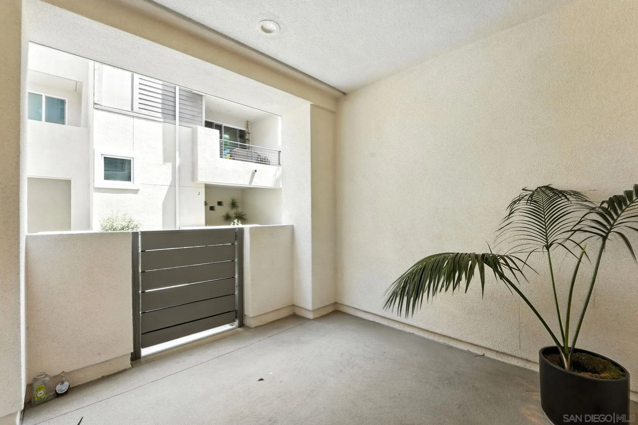 2275 Element Way, Unit 4 Chula Vista, CA 91915 - Photo 41 of 45 a view of a room that has a plant and a window