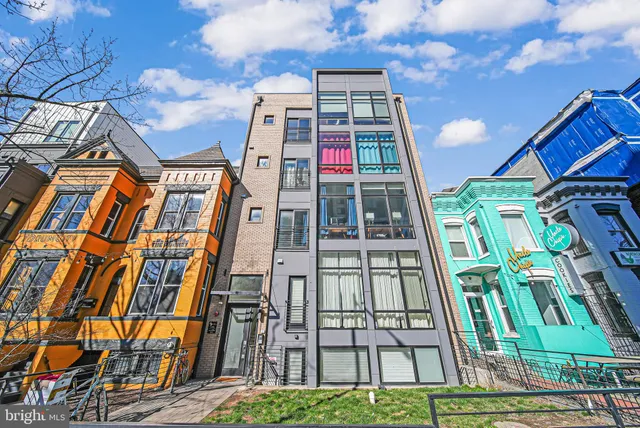 a bathroom with a tub and shower