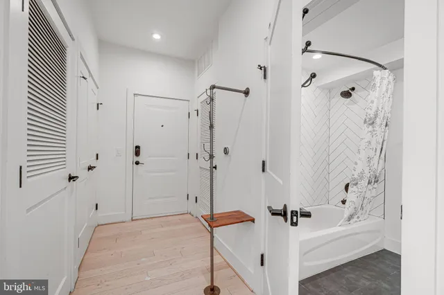 a kitchen with stainless steel appliances granite countertop a stove and cabinets