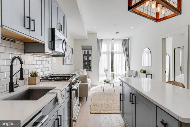 a bed room with a bed and a large mirror