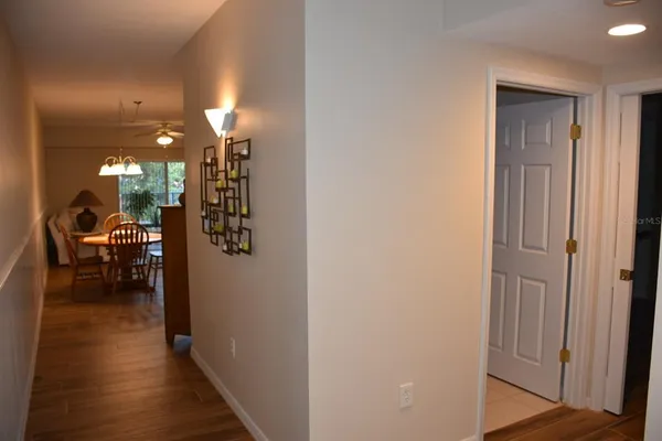 a view of a livingroom from a hallway