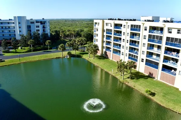 a view of building with yard