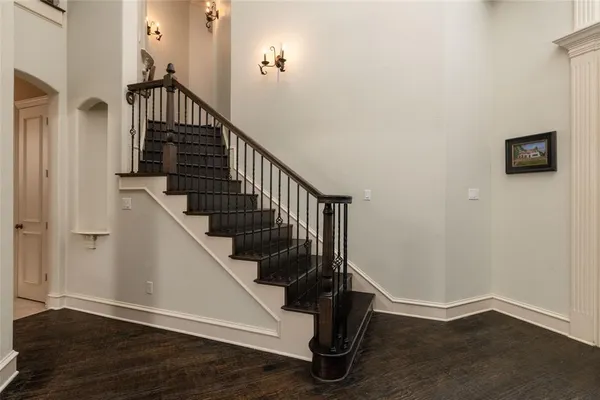 a view of entryway with wooden floor